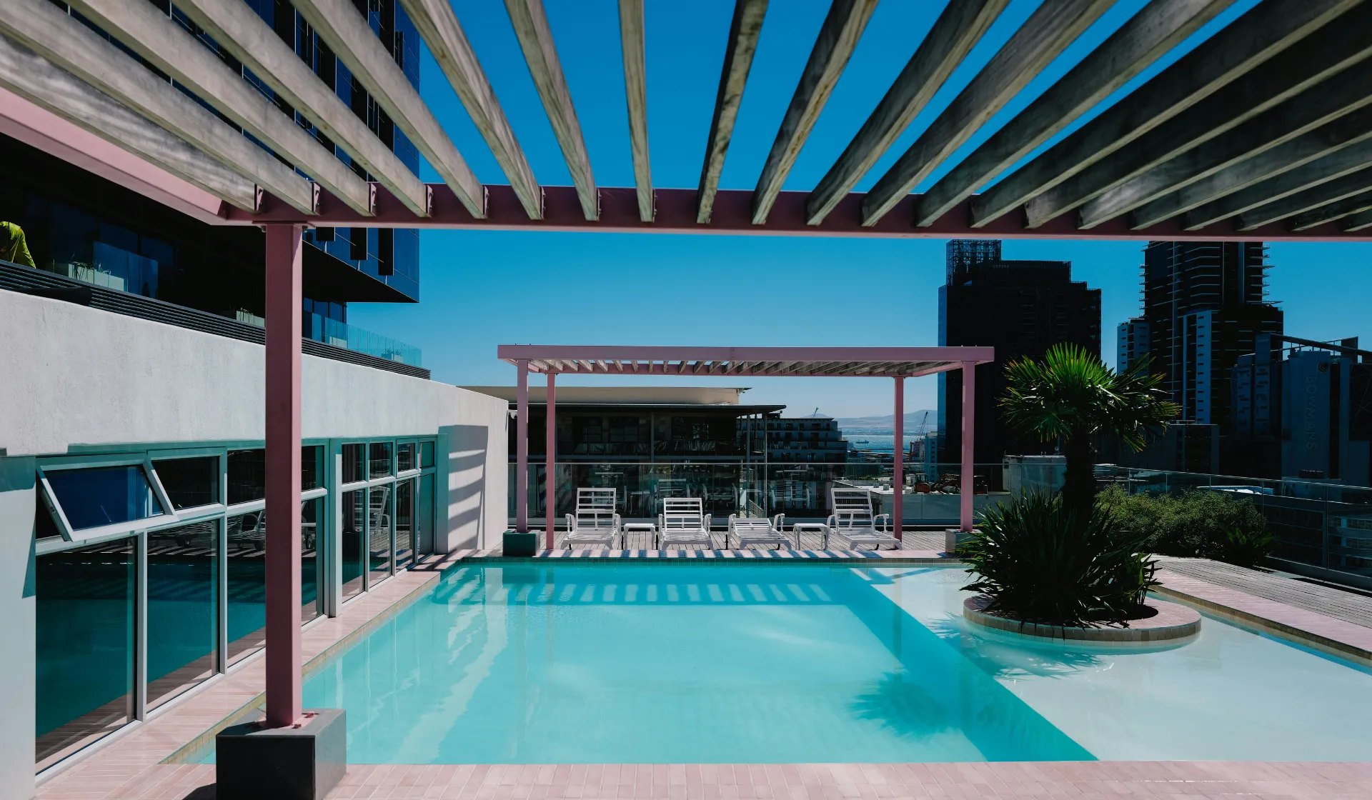Homeowner using a smartphone to research pool builders online, illustrating the digital-first decision journey that LeadGulls pool marketing strategies intercept through Google, Facebook, email, and social media